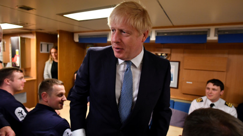 Britain's Prime Minister Boris Johnson visits in Scotland REFILE - CORRECTING NAME OF THE SHIP Britain's Prime Minister Boris Johnson meets crew members during a visit to HMS Victorious at HM Naval Base Clyde in Faslane, Scotland, Britain July 29, 2019. Jeff J Mitchell/Pool via REUTERS