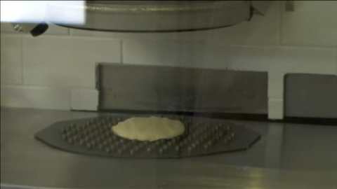 Un robot que hace pizza, lo último en cocina Un robot que hace pizza, lo último en cocina