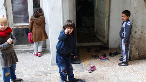 Niños sirios jugando en un orfanato de Gaziantep, en Turquía. / CORINA TULBURE