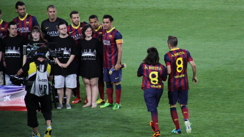 Anna Vives junto a Andrés Iniesta en el Camp Nou / MONTSERRAT VIVES
