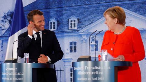 La canciller alemana, Angela Merkel, y el presidente francés, Emmanuel Macron. / REUTERS