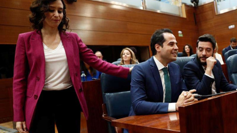 La candidata del PP a la Presidencia de la Comunidad de Madrid, Isabel Díaz Ayuso, y el candidato de Ciudadanos Ignacio Aguado, en la Asamblea de Madrid. (MARISCAL | EFE)