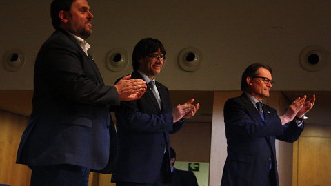 Junqueras, Puigdemont i Mas en una imatge d'arxiu, d'un acte del 2016.