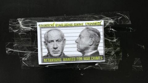Un cartel con el primer ministro israelí, Benjamin Netanyahu,y la frase "Se busca por crímenes de guerra". Un cartel con el primer ministro israelí, Benjamin Netanyahu,y la frase "Se busca por crímenes de guerra".