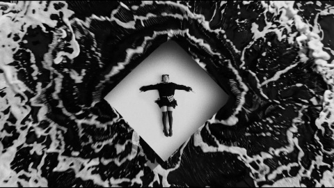 Spiritbox - No Loss, No Love (Official Music Video) New album 'Tsunami Sea' out now via Pale Chord/Rise Records — buy/stream at https://spiritbox.lnk.to/TsunamiSea.
For tour info, tickets and more visit https://spiritbox.com/.
Follow Spiritbox at
Instagram: https://spiritbox.com/
Twitter: https://twitter.com/spiritboxband
Facebook: https://www.facebook.com/Spiritboxofficial
Spotify: https://open.spotify.com/artist/4MzJMcHQBl9SIYSjwWn8QW?si=wFU8i2wpSBuM-fjDnqmW8g
Youtube: https://www.youtube.com/channel/UCmWxquutalJ1ZjdmWLdlhSg
Directed by / Max Moore, Mike Stringer
https://www.maxmoorefilms.com/
Edited & VFX / Max Moore
Executive Producer / Max Rose
Production Manager / Yafate Shifraw
Director of Photography / lan Hurdle
1st AC / Paul Weidt
2nd AC / DIT / Maud Laurent
Gaffer / Michael Rodgers
BBE / Dan Gould
Key Grip / Jesus Yanez
Best Boy Grip / John Portillo
Key PA / Driver / Kelsey Miralles
PA / Client Crafty / Maria Celeste Mora
PA / Jorge Ramirez
GLAM / Hair/ Lana Hunter
GLAM MU / Christina Guerra
GLAM / MUA / Angie Peek
Colorist / Cameron Marygold
Additional VFX / Nic Torres
Management / Jason Mageau
Commissioner / Sean Heydorn
Director Rep / Jen Herrera / Las Bandas Be Brave
Production Company / Tuff
Lyrics
I feel as clear as the eye in the sky
Send me down in a spiral
Foundation stays as sediment slides
Sudden death in the hollow
Misery is a delicate lace, silence as it covers my face
Now I feel as clear as the eye that I follow
Send me down in a spiral
I call out with no answer
I was born in an estuary destined for the sea
I was surrounded by pearls that I could not eat
and diamonds that I could not drink
Silent screaming
Voices beckon
Beta drift I beg you, join me
Forest sinking
Broken vortex
Beta drift I beg you, join me
I feel as clear as the eye in the sky
Send me down in a spiral
Foundation stays as sediment slides
Sudden death in the hollow
Misery is a delicate lace, silence as it covers my face
Now I feel as clear as the eye that I follow
Send me down in a spiral
OH, Twist my face in a desolate smile
Taste the salt in my blood
There is a waste, I feel no sentiment
No loss, no love
On a bleached cavern of bones, I reach my destination
An island of solace beneath a corpse's feet
I can feel something sinister under the surface
I know an island that breathes is a body that eats
And now it's showing its teeth
Under the surface I see
now it's showing its teeth
Under the surface I see
now it's showing its teeth