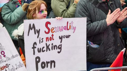15 February 2025, Hamburg: A sign reading "My Sexuality is not your fucking Porn" can be seen at the Hamburg Pride rally against "hate and agitation" at Spielbudenplatz on the Reeperbahn. The day of action in the St. Pauli district took place as part of the nationwide Christopher Street Day campaign "Choose Love". Photo: Georg Wendt/dpa (Photo by Georg Wendt / dpa Picture-Alliance via AFP)