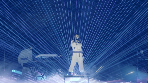 YOASOBI「アイドル」(Idol) from 『YOASOBI ARENA TOUR 2023 "電光石火"』2023.6.4@さいたまスーパーアリーナ Streaming & Download : https://orcd.co/yoasobi_idol
映像提供:WOWOW
7月8日(土)21時〜WOWOWにて6/3(土)公演の模様を全曲ノーカットで放送・配信!
https://www.wowow.co.jp/detail/191830
○TVアニメ『【推しの子】』オープニング主題歌
https://ichigoproduction.com/
○インスト音源はこちら
https://piapro.jp/t/KQn0
--
無敵の笑顔で荒らすメディア
知りたいその秘密ミステリアス
抜けてるとこさえ彼女のエリア
完璧で嘘つきな君は
天才的なアイドル様
今日何食べた?
好きな本は?
遊びに行くならどこに行くの?
何も食べてない
それは内緒
何を聞かれても
のらりくらり
そう淡々と
だけど燦々と
見えそうで見えない秘密は蜜の味
あれもないないない
これもないないない
好きなタイプは?
相手は?
さあ答えて
「誰かを好きになることなんて
私分からなくてさ」
嘘か本当か知り得ない
そんな言葉に
また一人堕ちる
また好きにさせる
誰もが目を奪われていく
君は完璧で究極のアイドル
金輪際現れない
一番星の生まれ変わり
その笑顔で
愛してるで
誰も彼も虜にしていく
その瞳が
その言葉が
嘘でもそれは
完全なアイ
はいはいあの子は特別です
我々は端からおまけです
お星様の引き立て役Bです
全てがあの子のお陰な訳ない
しゃらくさい
妬み嫉妬なんてない訳がない
これはネタじゃない
からこそ許せない
完璧じゃない君じゃ許せない
自分を許せない
誰よりも強い君以外は認めない
誰もが信じ崇めてる
まさに最強で無敵のアイドル
弱点なんて見当たらない
一番星を宿している
弱いとこなんて見せちゃ
ダメダメ
知りたくないとこは見せずに
唯一無二じゃなくちゃ
イヤイヤ
それこそ本物のアイ
得意の笑顔で沸かすメディア
隠しきるこの秘密だけは
愛してるって嘘で積むキャリア
これこそ私なりの愛だ
流れる汗も綺麗なアクア
ルビーを隠したこの瞼
歌い踊り舞う私はマリア
そう嘘はとびきりの愛だ
誰かに愛されたことも
誰かのこと愛したこともない
そんな私の嘘がいつか本当になること
信じてる
いつかきっと全部手に入れる
私はそう欲張りなアイドル
等身大でみんなのこと
ちゃんと愛したいから
今日も嘘をつくの
この言葉が
いつか本当になる日を願って
それでもまだ
君と君にだけは言えずにいたけど
やっと言えた
これは絶対嘘じゃない
愛してる
--
Couldn't beat her smile, it stirred up all the media Secret side, I wanna know it
So mysterious
Even that elusive side, part of her controlled area Complete and perfect
All you say is a bunch of lies
Dear miss genius idol, unmatched What did you eat today?
What book do you love?
Whenever you go out for fun, tell me, where do you go?
Haven’t eaten anything
It's a secret, unknown
Any questions you're facing, always acting so vaguely
So unconcerned, although you brightly glow
Any seemingly unveiled secrets are as sweet as honey Confusing, why, why, why?
Essential lie, lie, lie
So, what is your type of guy? Any partner?
So, now, answer this
"I don't have any idea how I could love anyone” “I don't seem to know what it signifies"
Cannot find out if it's true or it's a lie
Once again, there's somebody who's fallen for the words and cues Made him lose his head over you
That emotion melts all hearts, all eyes on you Cause you are perfect, the most ultimate idol Unrivaled, will not appear again
It's the brightest star reborn, yes, indeed Using that smiling face
That "I love you" again
Now, everybody is lured and captivated by you The pupil that you got
The words you vocalize
Even when untrue, it’s your perfected Ai
Right, right, we all know she's very special, yes
We had lost the fight before it started, so impressed Miss I'm such a star
We're serving as support to her grace
Cannot tell me everything was because of her No, it's not right
Out of line
How can we not feel jealous while being around It's not a joke, you know, right?
So, I cannot forgive you for that
Completely deny Imperfect you that I sight Myself, no pardon allowed
I won't allow anyone if it's not you, strongest of all
That emotion seized all hearts worshiping you Yes, indeed
So strong, it's you, unrivaled idol There cannot be weaknesses to find The brightest star is residing in you
The gaps and shortcomings, don't show’em Dammit, dammit
Parts nobody wants to know should remain hidden
One and only
If it's different, no way, no way Such a true love, it's the realest Ai
Showing this smile, my own weapon Boiling media
Keeping everything about my secret deep inside
"I'm in love with you," my career is built on such a lie It's the way I know to show my love, without a doubt Running down, my sweat is flowing
Cleanest aqua, right?
Ruby hidden under my eyelids where it resides I sing and dance around
Look at me, I'm Maria
So, lying surely is the greatest kind of love
I recall no one that loved me whole before And I've not been in love with anybody before Now, the lies I'm making up
I'm hoping that a day comes when they all become true And I keep wishing they do
One day, I will hold everything that I pursue Yes, I am so greedy, true voracious idol
So, sincerely, what I'm wishing for is to love each of you with all my heart And so, today, I lie again
The words I vocalize inside of me
I'm wishing that one day they come true Up to this day, I've not been able to let you
And you hear me saying those meaningful words
I said it at last
I know it's not a lie as I'm voicing these words I love you
--
#YOASOBI #アイドル #推しの子
