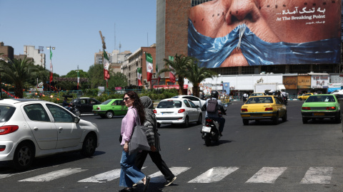 People walk past an anti-U.S. billboard depicting U.S. President Donald Trump and the Strait of Hormuz, in Tehran, Iran, May 30, 2026. Majid Asgaripour/WANA (West Asia News Agency) via REUTERS ATTENTION EDITORS - THIS PICTURE WAS PROVIDED BY A THIRD PARTY. ISRAEL OUT. NO COMMERCIAL OR EDITORIAL SALES IN ISRAEL. NO ACCESS FOR ISRAELI MEDIA. NO USE BBC PERSIAN. NO USE VOA PERSIAN. NO USE MANOTO. NO USE IRAN INTERNATIONAL. NO USE RADIO FARDA. DIGITAL: NO USE BBC PERSIAN. NO USE VOA PERSIAN. NO USE MANOTO. NO USE IRAN INTERNATIONAL. NO USE RADIO FARDA.