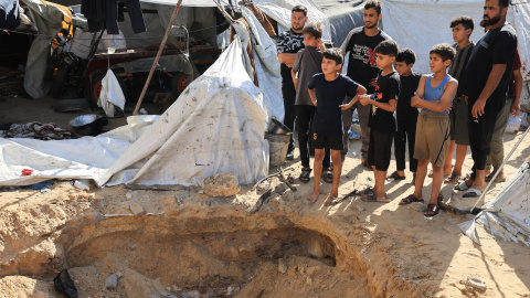2026-08-02T162121Z_1044122575_RC2EQMA5JS3E_RTRMADP_3_ISRAEL-PALESTINIANS-GAZA Palestinians inspect the site of an Israeli strike on a tent, according to medics, in Gaza City, August 2, 2026. REUTERS/Dawoud Abu Alkas