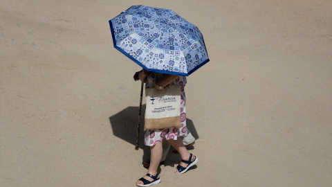 Personas afectadas por el calor pasean por Madrid Río, a 21 de julio de 2026. Personas afectadas por el calor pasean por Madrid Río, a 21 de julio de 2026.