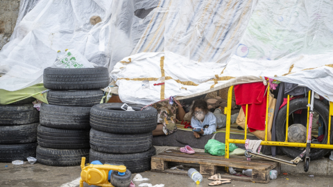 Migrantes acampados en las naves del Tarajal, a 21 de agosto de 2026, en Ceuta. Migrantes acampados en las naves del Tarajal, a 21 de agosto de 2026, en Ceuta.