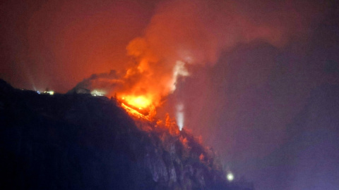 The Kehlsteinhaus, known as the Eagle's Nest, formerly Adolf Hitler's mountain retreat, is engulfed in flames on late October 23, 2026, after a large fire had broken out at the site located at an altitude of 1,834 metres (6,000 feet) in the mountains over Berchtesgaden, in the southern German state of Bavaria. Emergency services arrived on site on late October 23, 2026 and found a large fire. German police said on October 24, 2026 they have detained a suspect following a fire at Adolf Hitler's mountain retreat, known as the Eagle's Nest. (Photo by Ferdinand DÖRFLER-FARTHOFER / 7aktuell / AFP)