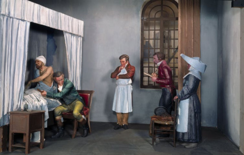 Diorama que muestra a René Laennec examinando a un paciente con un estetoscopio inventado por él en la mano. Wikimedia Commons / Wellcome Trust, CC BY-SA