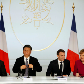 El presidente francés Emmanuel Macron, el presidente chino Xi Jinping, la canciller alemana Angela Merkel y el presidente de la Comisión Europea Jean-Claude Juncker, en su reciente reunión en París. REUTERS