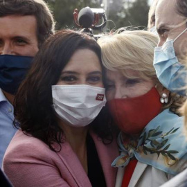 Casado, Ayuso y Aguirre, en el mitin del cierre de campaña del PP en Madrid. EFE