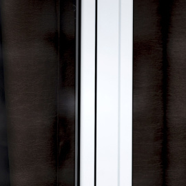 Una vecina se asoma a la ventana de su casa en el pueblo de Lamas (Xinzo de Limia), en Ourense. EFE/Brais Lorenzo