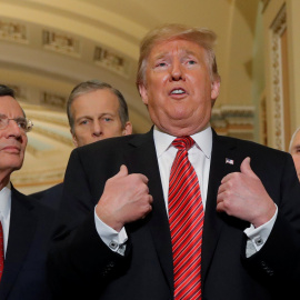 U.S. President Trump speaks to reporters after Senate Republican policy meeting on Capitol Hill in Washington