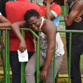 Un migrante tras ser informado por las autoridades mexicanas que no puede recibir su visa humanitaria | Reuters