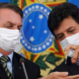 Luiz Henrique Mandetta y Jair Bolsonaro. REUTERS