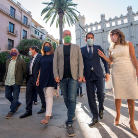 La ministra de Trabajo y Economía Social, Yolanda Díaz (d), el ministro de Inclusión, Seguridad Social y Migraciones, José Luis Escrivá (2i), la presidenta de Baleares, Francina Armengol (3i) y los secretarios generales de UGT, Pepe Álvarez (i) y de