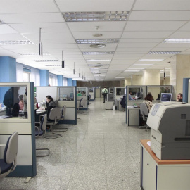 Funcionarios en unas oficinas de la adminisración central. E.P.