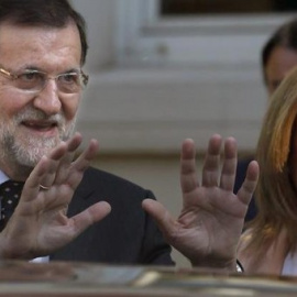El presidente del Gobierno, Mariano Rajoy, con su ministra de Empleo, Fátima Báñez, impulsora de la reforma laboral de 2012.