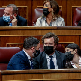 Santiago Abascal, Iván Espinosa de los Monteros y Macarena Olona, a 14 de diciembre de 2021, en Madrid.- Ricardo Rubio / Europa Press