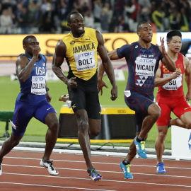 Usain Bolt durante la carrera.- REUTERS