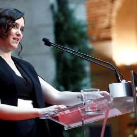 La presidenta de la Comunidad de Madrid, Isabel Díaz Ayuso, da un discurso durante la ceremonia por el 42 aniversario de la Constitución Española, este viernes, en la Real Casa de Correos, en Madrid.