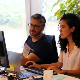 Treballadors en una oficina.