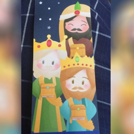 Marcapáginas de la Junta del Distrito de Moncloa- Aravaca para la campaña de Navidad, con un Baltasar blanco.