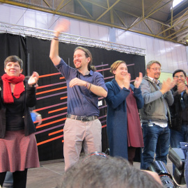 Pablo Iglesias, Ada Colau y Xavi Domènech en un acto de Podem. Archivo/EUROPA PRESS