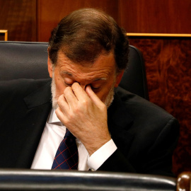 El presidente del Gobierno, Mariano Rajoy, este miércoles, en el pleno del Congreso donde la oposición le interpeló por la presunta financiación irregular del PP. REUTERS/Paul Hanna