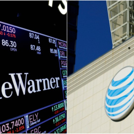 El logo de Time Warner en una pantalla en la Bolsa e Nueva York (NYSE), y el de AT&T, en un edificio en el centro de Los Ángeles. REUTERS