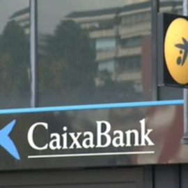 CaixaBank gana casi 4 veces más por la fusión y planea elevar el dividendo