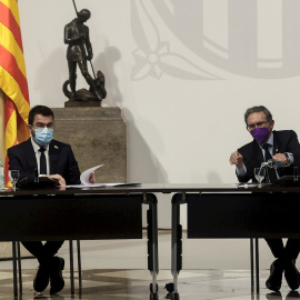 El presidente de la Generalitat, Pere Aragonès, junto al Conseller de Economía Jaume Giró (d) este martes 20 de julio de 2021.