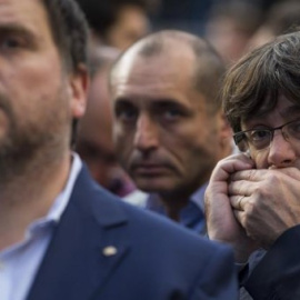 Oriol Junqueras i Carles Puigdemont en una imatge d'arxiu durant una manifestació. EFE / Enric Fontcoberta