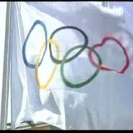 La bandera olímpica se pasea por las favelas de Río