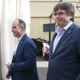 El expresidente de la Generalitat Carles Puigdemont y el exconseller Jordi Turull llegan al Congreso de Junts, a 4 de junio de 2022