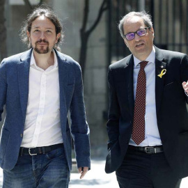 El presidente catalán, Quim Torra, y el secretario general de Podemos, Pablo Iglesias, se han visto en Barcelona. (ANDREU DALMAU | EFE)