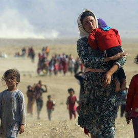 Foto de archivo de una familia de desplazados a causa de la guerra en Siria. / RODI SAID (REUTERS)