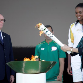 Dilma Rousseff, el día 3, sosteniendo la antorcha olímpica. /EFE