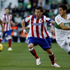 Partido entre el Elche y el Atlético esta temporada. MANUEL LORENZO / EFE
