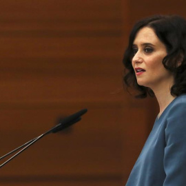 La candidata del PP a la Presidencia de la Comunidad de Madrid, Isabel Díaz Ayuso, durante su discurso de la primera sesión del pleno de investidura en el que expone su programa de gobierno en coalición con Cs y con apoyo de Voz. La oposici