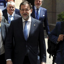 Mariano Rajoy, con Jorge Moragas y el ministro de Asuntos Exteriores, José Manue García Margallo. EFE