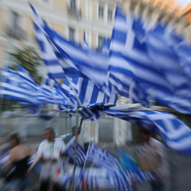 Partidarios de Syriza y votantes del 'No' celebran los primeros datos del referéndum que dan como ganador al No./ EFE