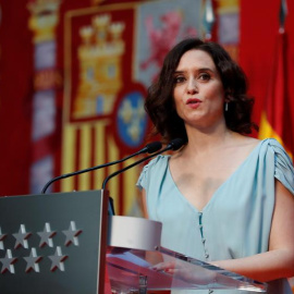 La presidenta de la Comunidad de Madrid, Isabel Díaz Ayuso, durante su intervención en el acto de la toma de posesión de los consejeros del primer Gobierno de coalición del PP y Ciudadanos en la región, este martes en la Real Casa de Correo