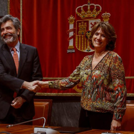 20/12/2018.- La ministra de Justicia Dolores Delgado y el presidente del Tribunal Supremo Carlos Lesmes, durante la firmad el acuerdo alcanzado sobre los criterios para medir la carga de trabajo, esta mañana en la sede del Consejo General d