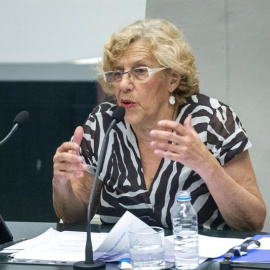 La alcaldesa de Madrid, Manuela Carmena, al inicio de su primer debate sobre el estado de la ciudad, en el que los grupos políticos harán balance del cambio en un Ayuntamiento gobernado por Ahora Madrid después de 24 años de gestión del PP.