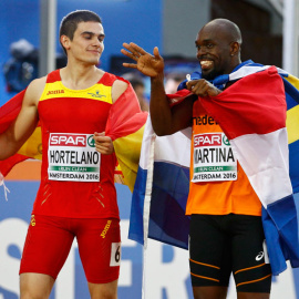 Bruno Hortelano y Churandy Martina, tras la final. REUTERS/Michael Kooren